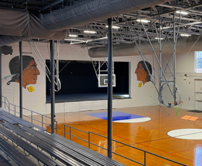 ADOA News Release and a basketball gymnasium